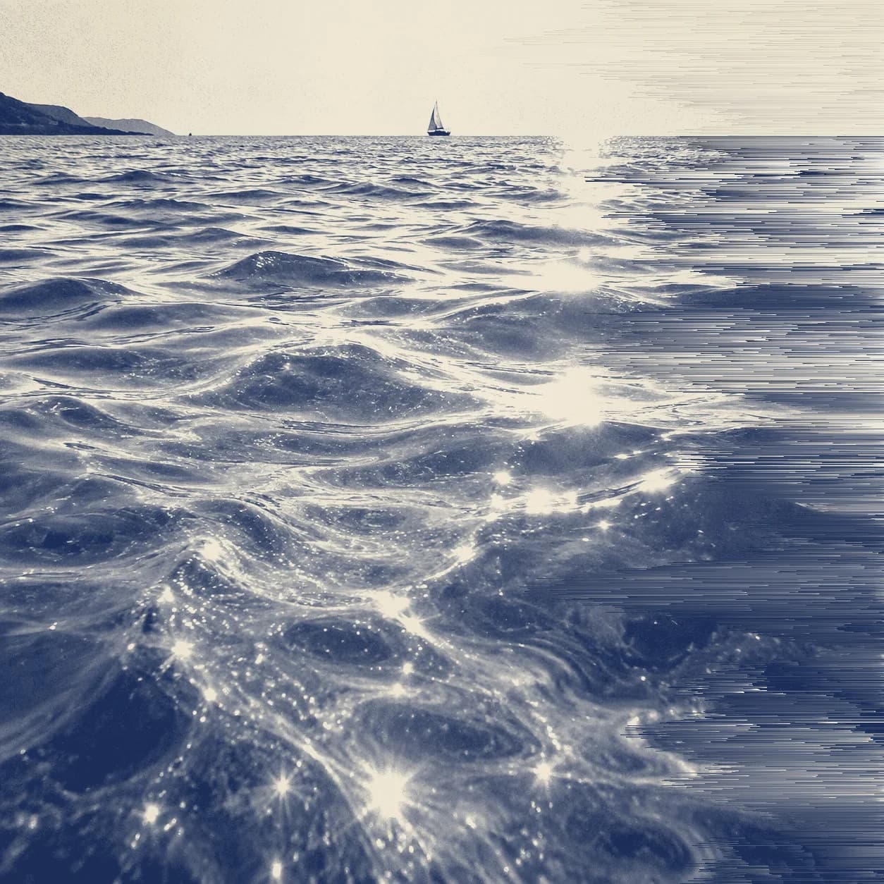 Blue and cream study of light rippling across the sea